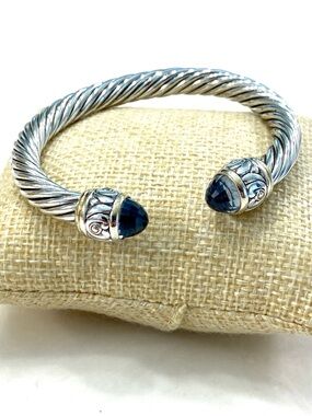 Twisted Silver Open Cuff Bracelet with Faceted Blue Gemstone Ends